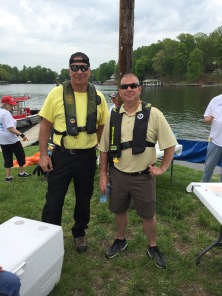 Lou Feldvary and Steven Small take a break from Take Pride in Smith Mountain Lake cleanup efforts on May 5 at Westlake Waterfront Inn at Indian Point Marina. The two are volunteers with Smith Mountain Lake Marine Fire/Rescue, which is coordinating debris pickup from docks of those not able to dispose of it themselves. Details on the program are available at takepridesml.com or by calling TLAC at 540-721-4400.